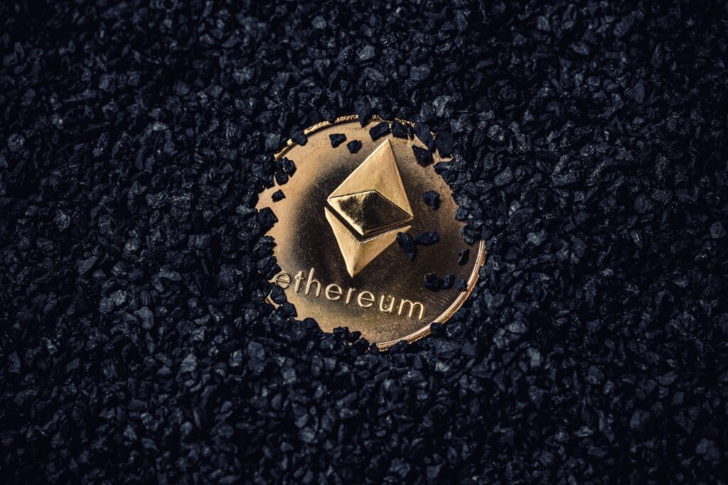 Gold coin with cryptocurrency logo
